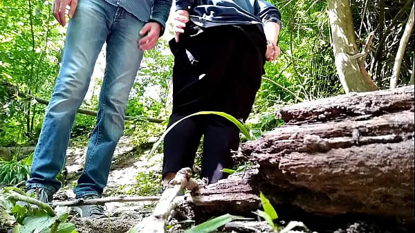 Žhavá Milf with a beautiful fat ass takes off her pants and pisses next to a stranger in nature skvělá videa